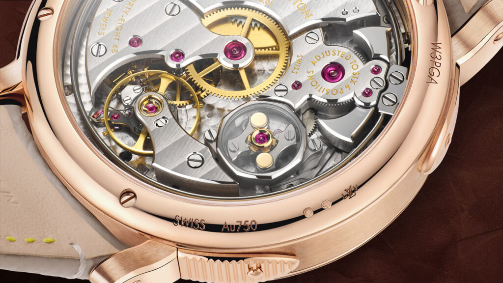 Side profile of the discreet repeater slide integrated into the watch lug.