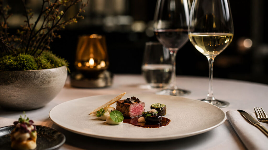 Modern fine dining tasting menu scene.